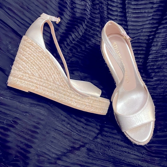 Brand new Stuart Weitzman wedges. Never been worn before.